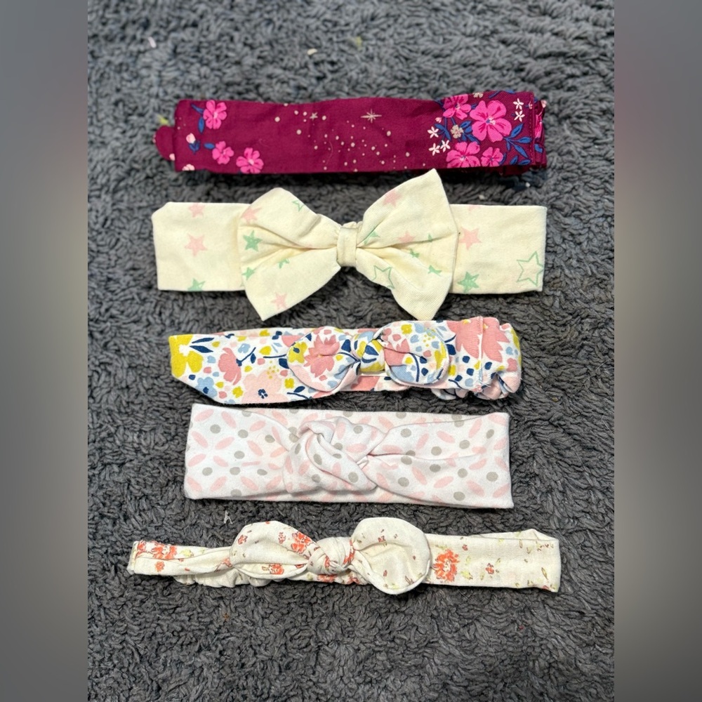 Lightly used set of 5 baby headbands